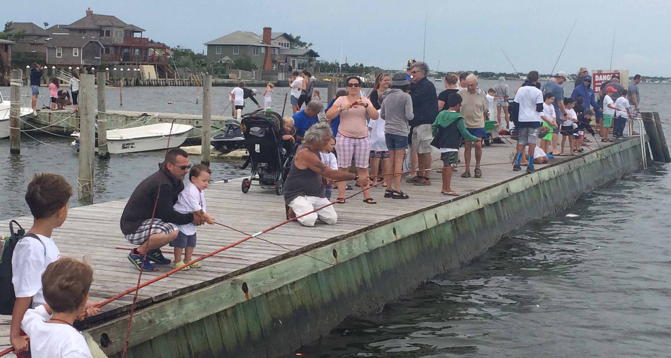 Ocean Beach Fishing Club's annual Catch And Release event for children on the dock
